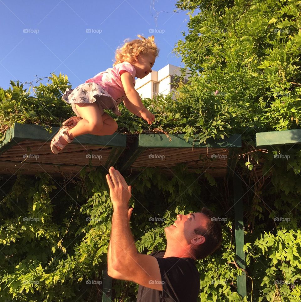 Father play with daughter