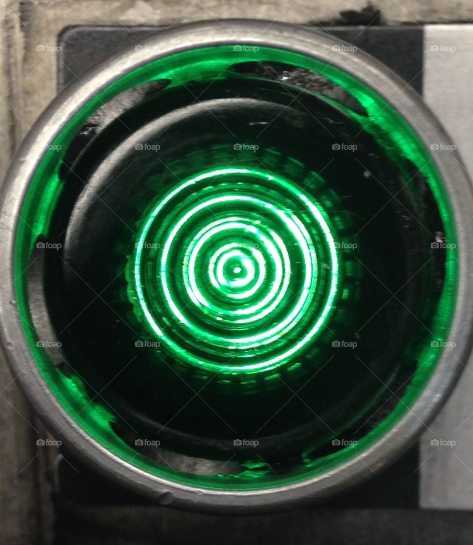 Green start button, light, control panel 