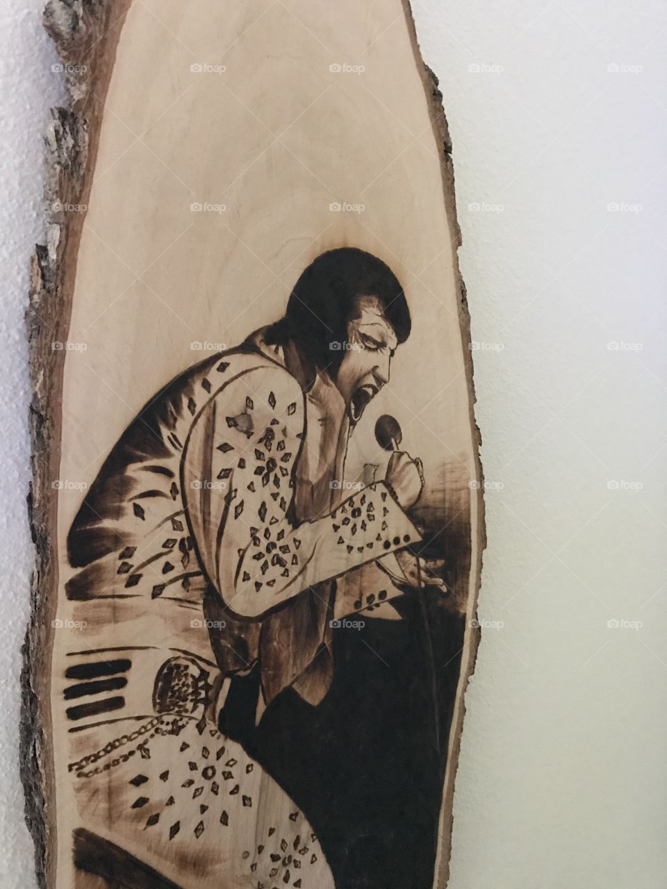 A hand carving of Elvis