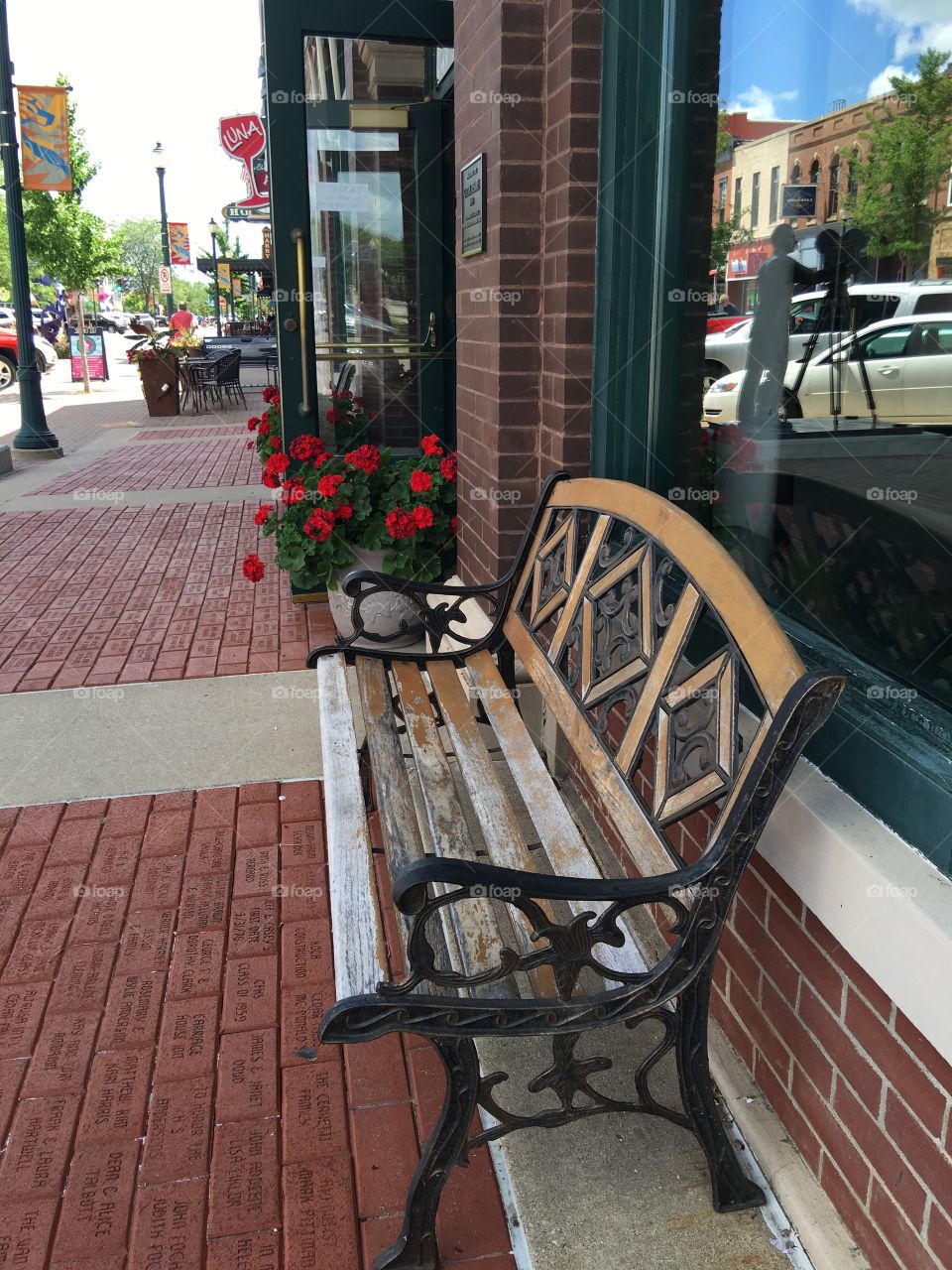 Park bench on Main Street in Cedar Falls, Iowa.