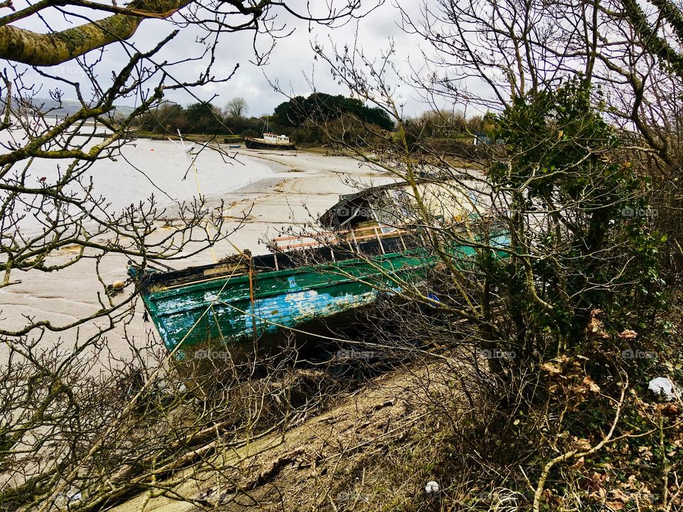 Hello Gratitude, docked level on the low tide. Waiting for the waters to place her back to a happier level. North Devon life on the estuary. 