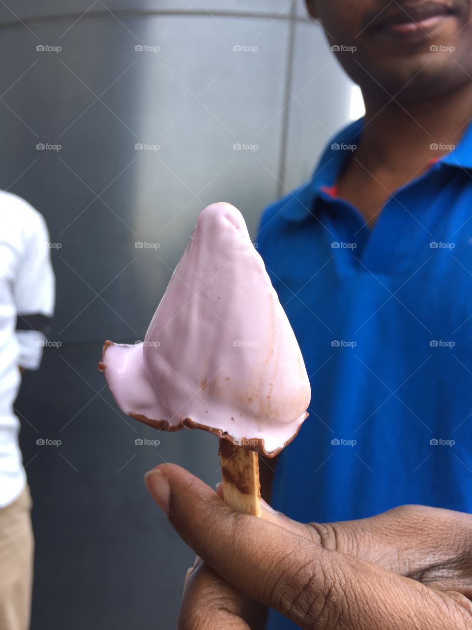 Ice cream in hand  with heart shape 