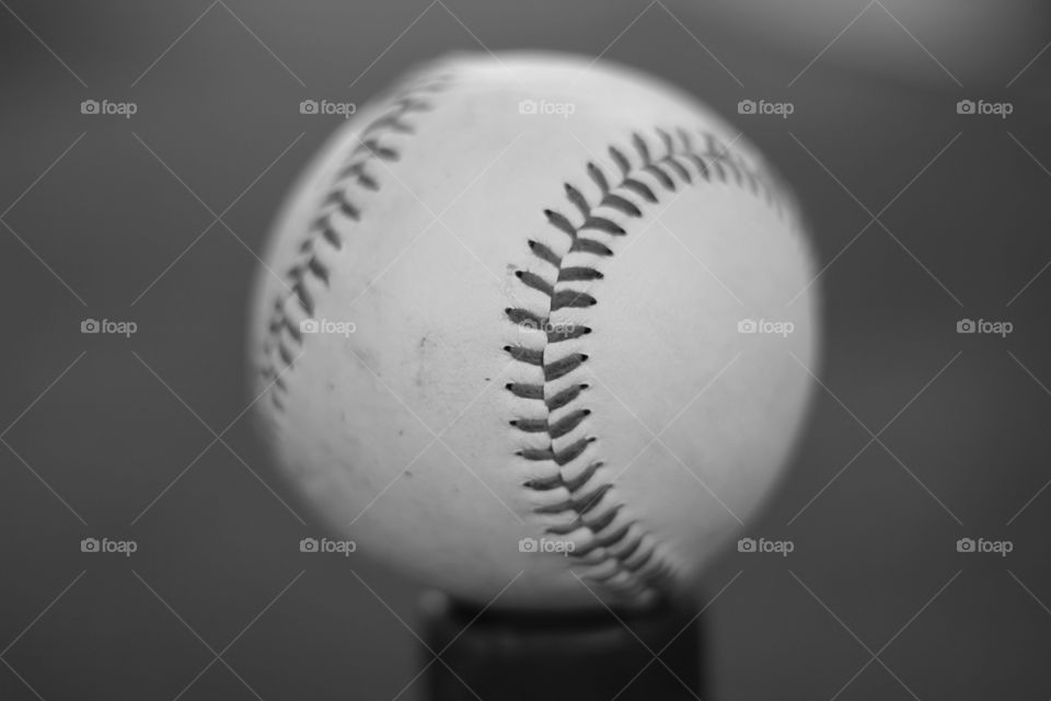 Black and white close up photo of a baseball