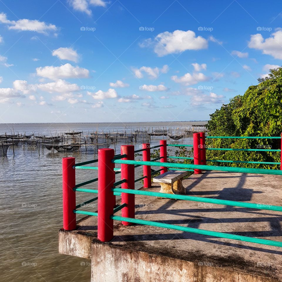Scenic view of sea against blue sky
