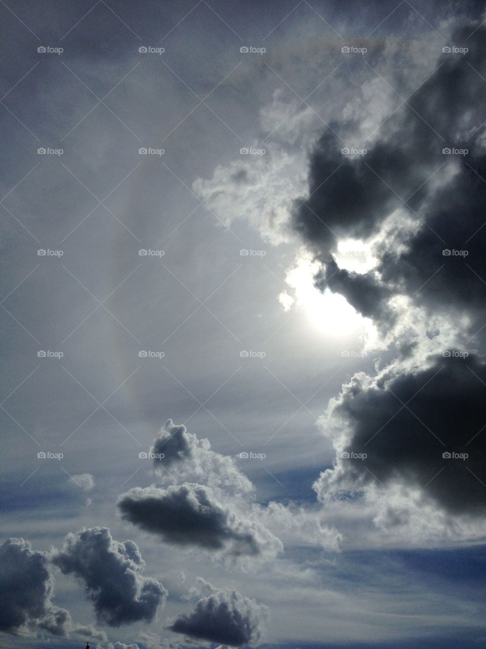 360 Rainbow. Captures light, space, and contrast of the clouds to the sky