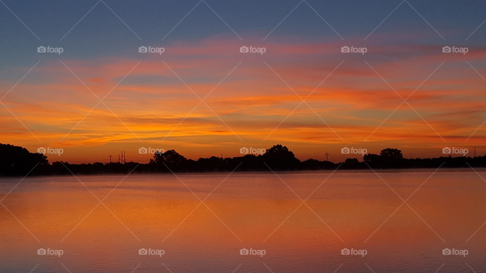 Beautiful Red Sky Before Sunrise  At Purcell City Lake Purcell Oklahoma