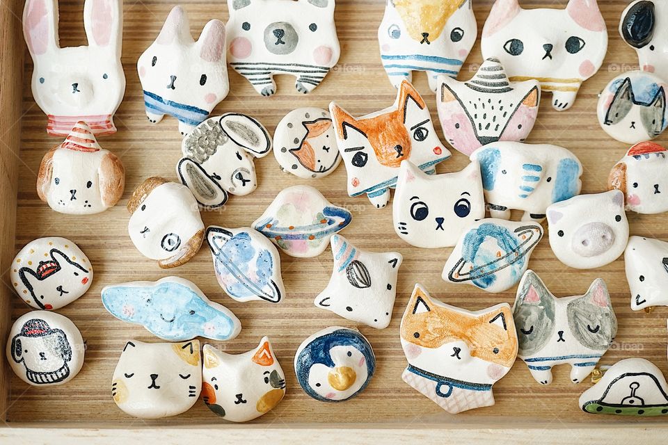 Cute ceramic animal magnets selling at the weekend market. Handmade, handicraft