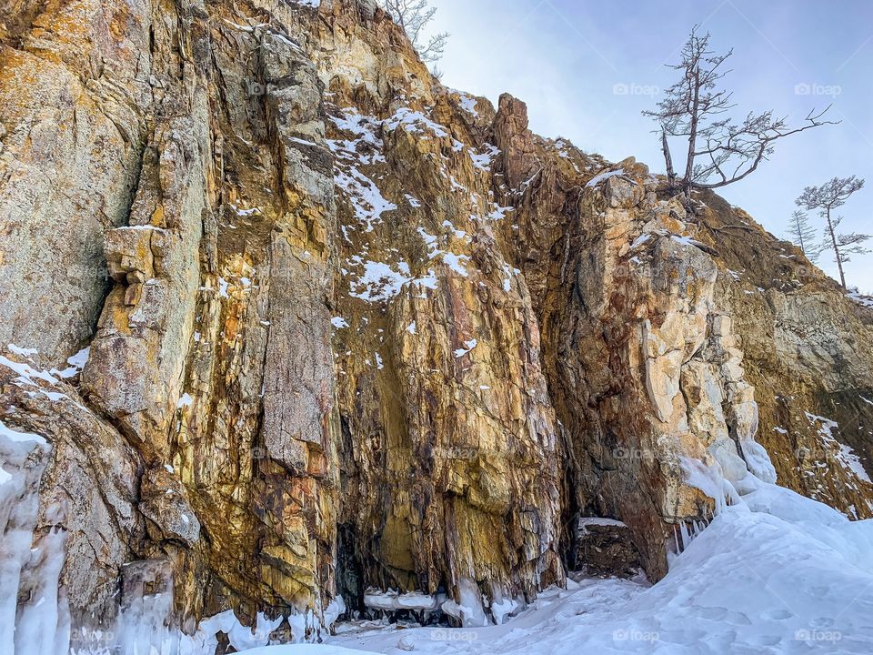 Cape Burhan, also called Shamanka, is one of the nine shrines of Asia. The ice that binds the waters of lake Baikal allows you to bypass the cape from all sides, come close to the surrounding rocks, in this case from the east.