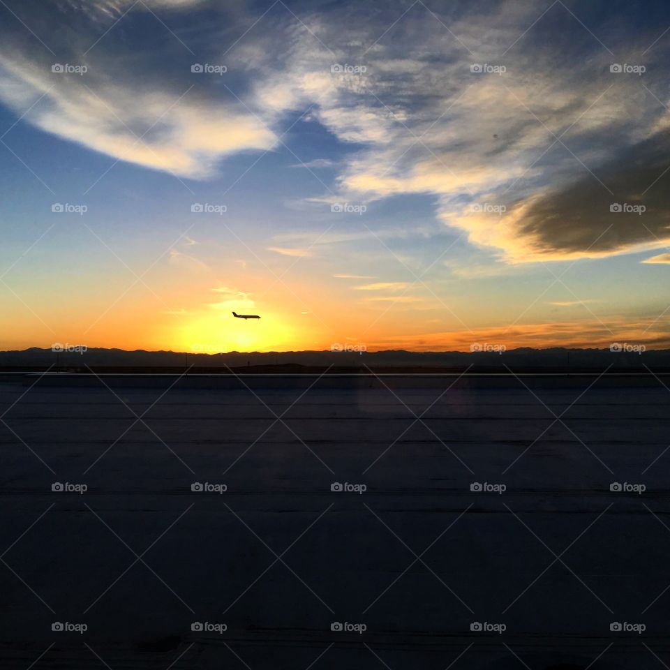 Sunset landings,  Denver, CO