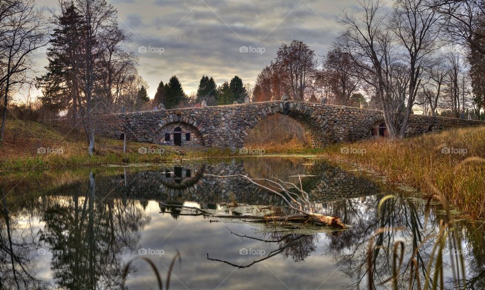 Stone bridge in manor at autumn, Torzhok, Russia