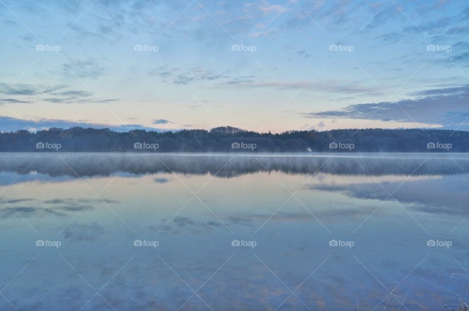 Cloud reflecting on lake