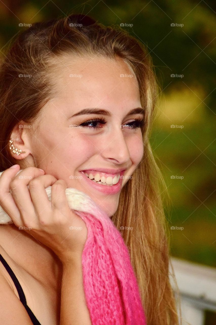 Beautiful young woman, candid, portrait, outdoors, beautiful smile, vivid pink accessories