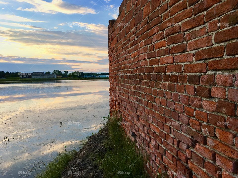 old abandoned farmhouse surrounded by rice fields, in the territory of Novara