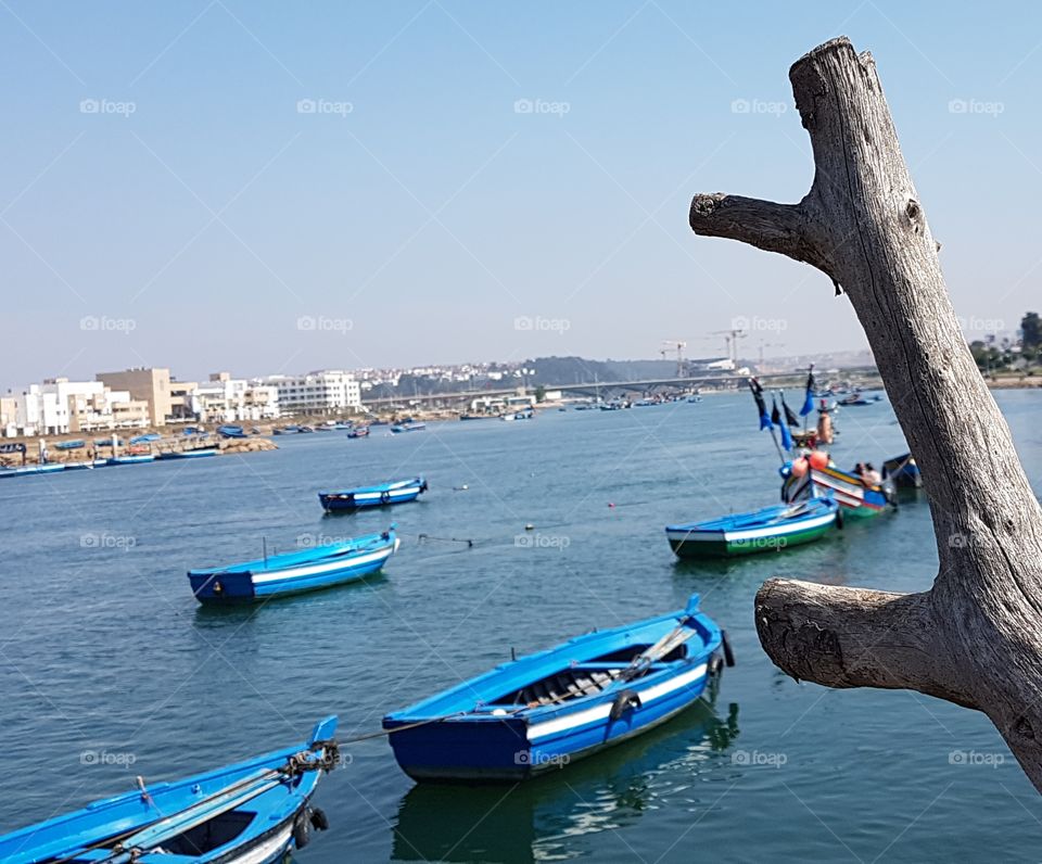 boat beach sea Morocco blue sky buildings