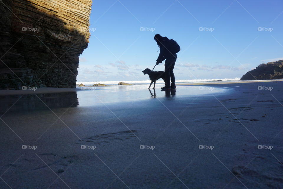 Beach#rock#human#dog#sky#exploring