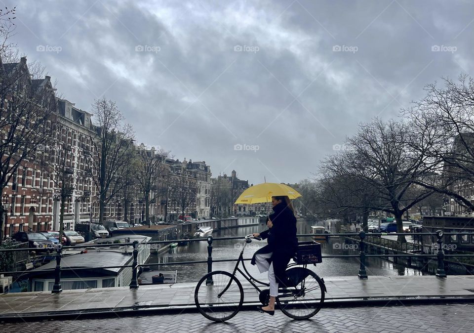 Biking in the rain with Umbrella