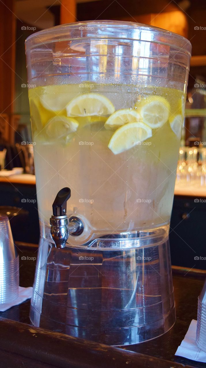 A dispenser of lemon water