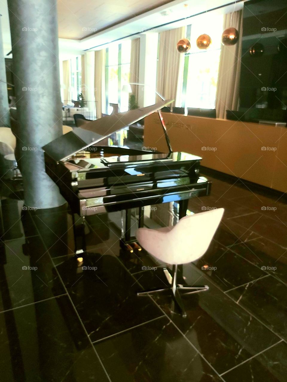 Piano at hotel lobby, rdy to play