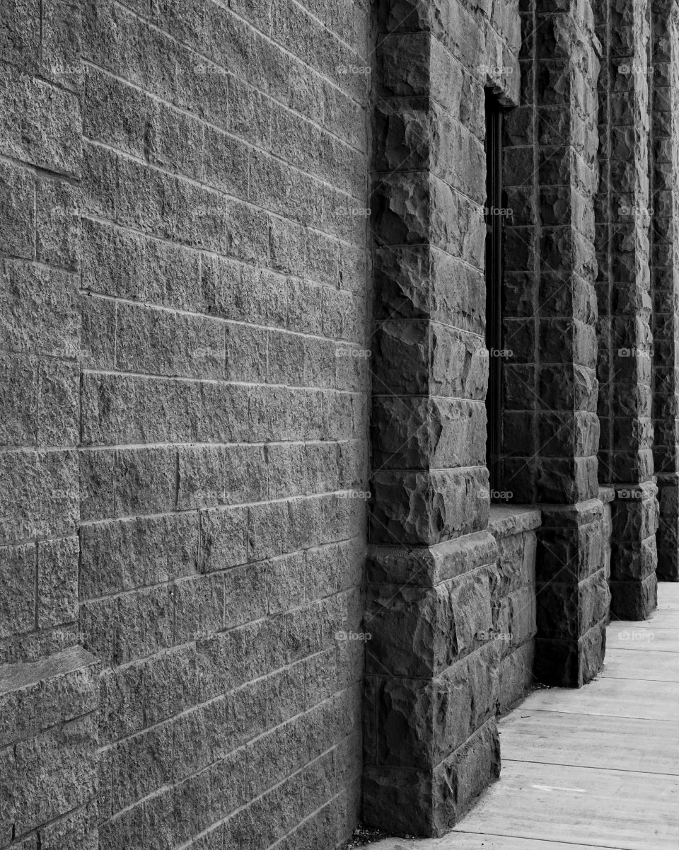 Old stone textured walls of the Bowman Museum in Prineville in Central Oregon. 