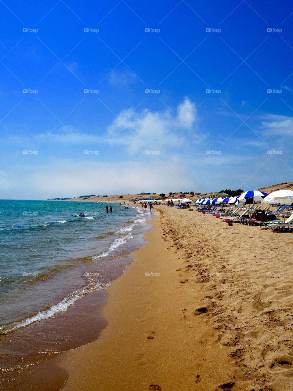 Issos Beach and sand dunes stretching out in the distance, Corfu, Greece