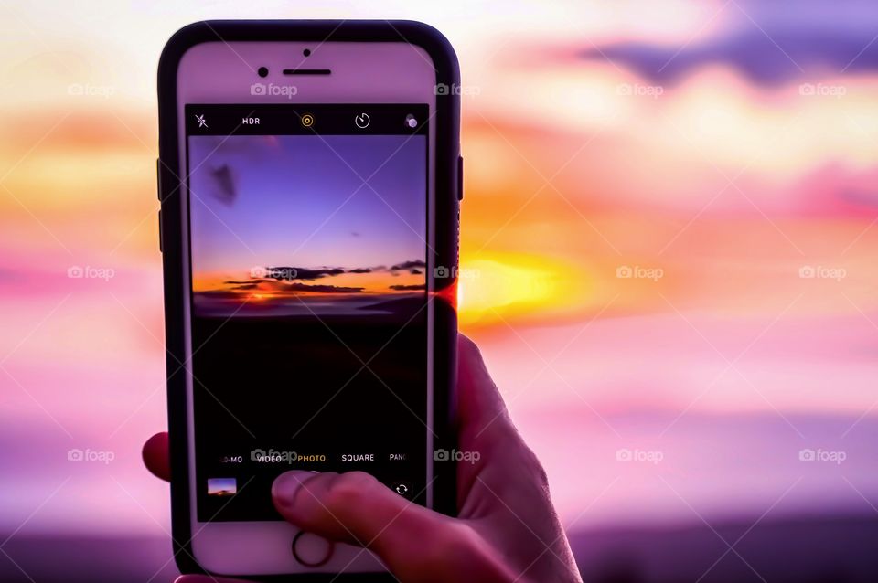 Capture the sunset how you can, you don't need a fancy camera to capture natural beauty.