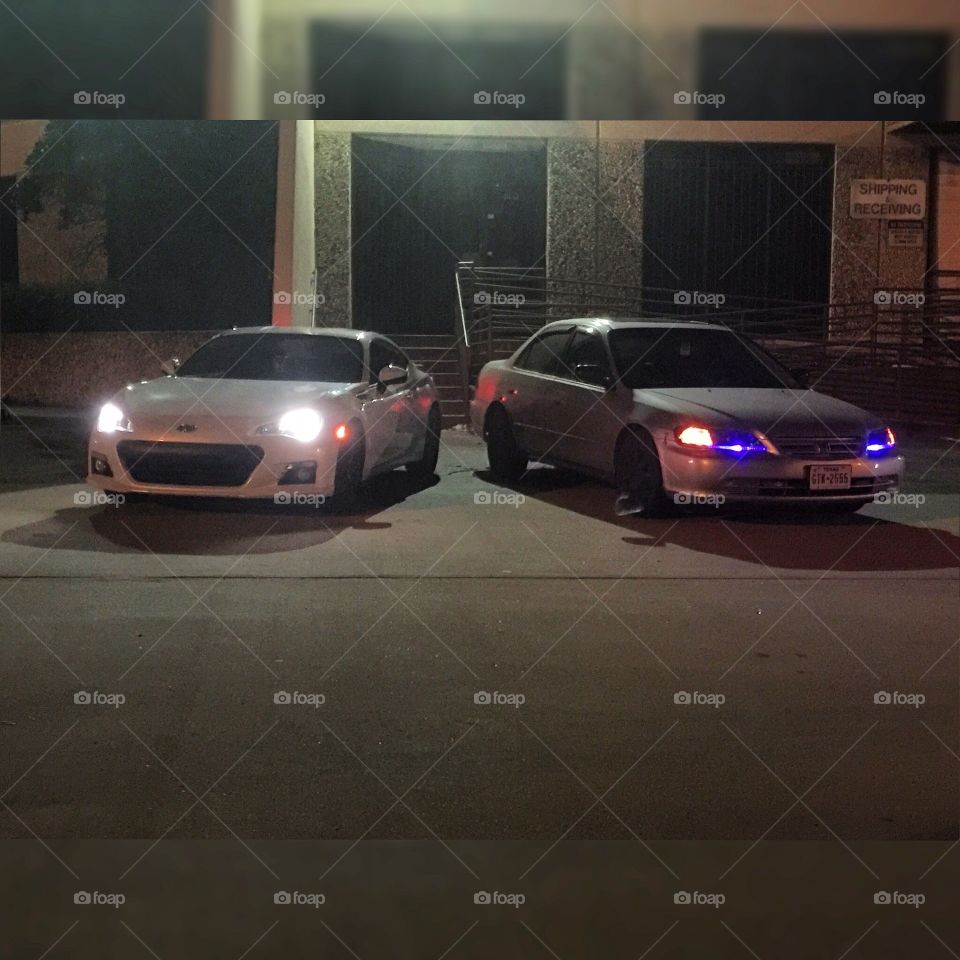 Me and my brother in the picture when we went to a car meet in downtown Houston 