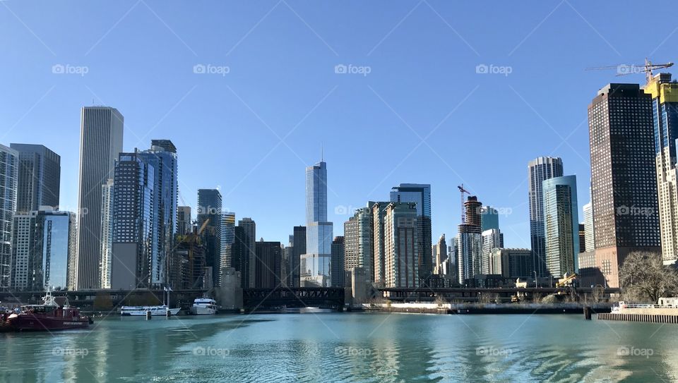 Panoramic view of the Chicago riverfront showcasing the variety and complexity of the unique buildings and architectural feats of the region 