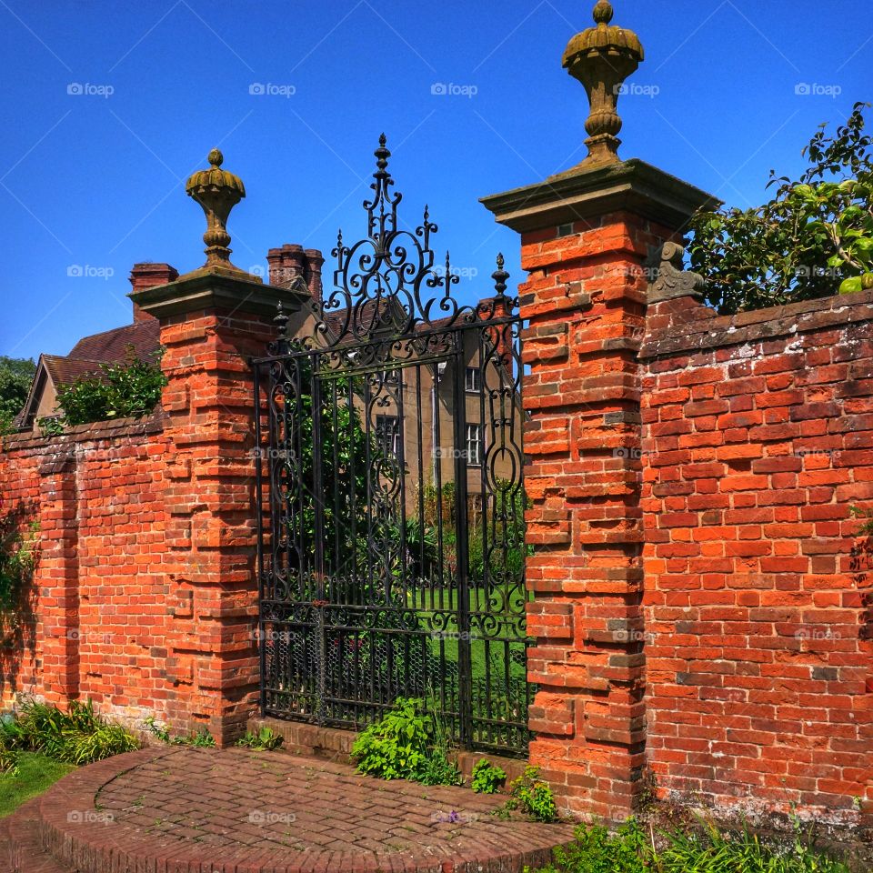 Formal gardens of Packwood House stately home - Warwickshire, England UK. 