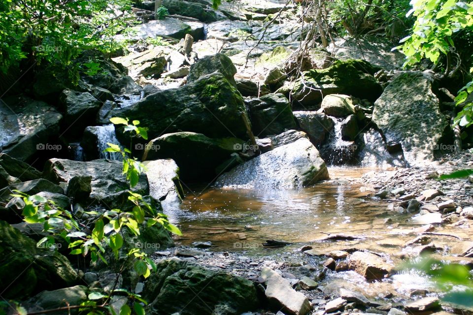 At the foot of the waterfall 