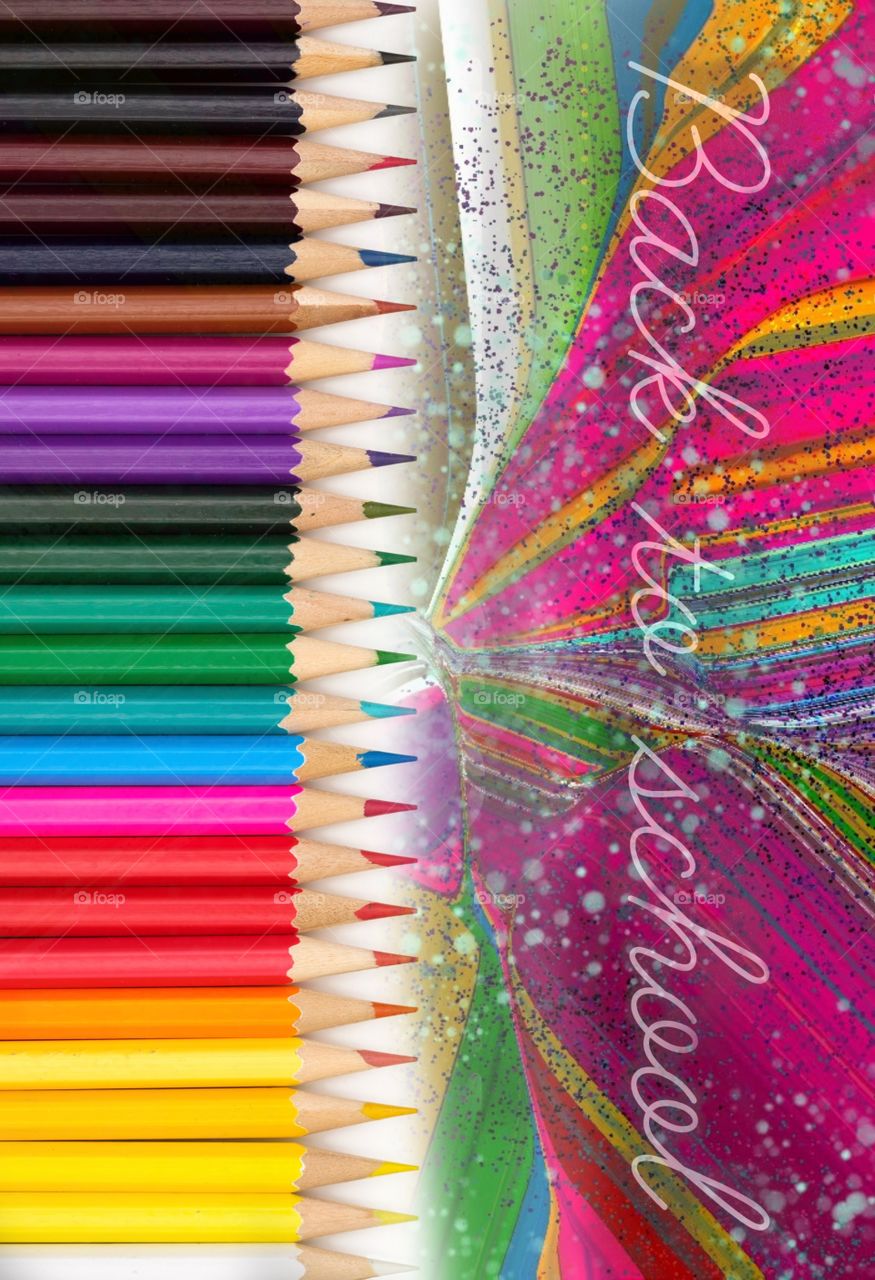 Colored pencils on colored background back to school