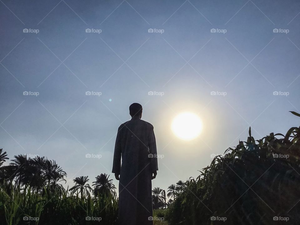 Traditional rural Egyptian costume inside the egyptian fields, winter 2017