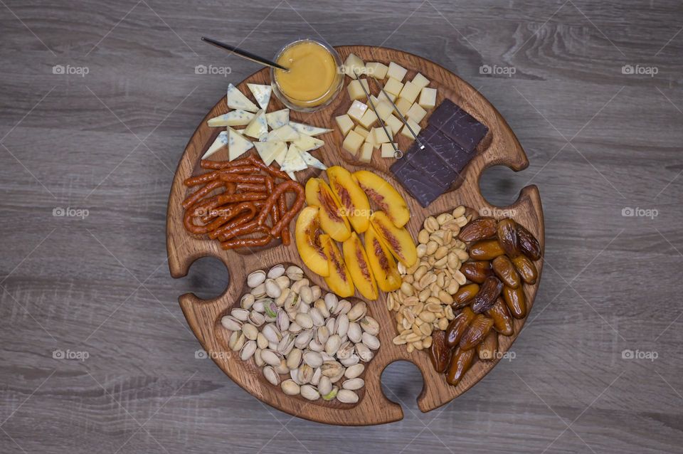 Top view of wood wine table with snack