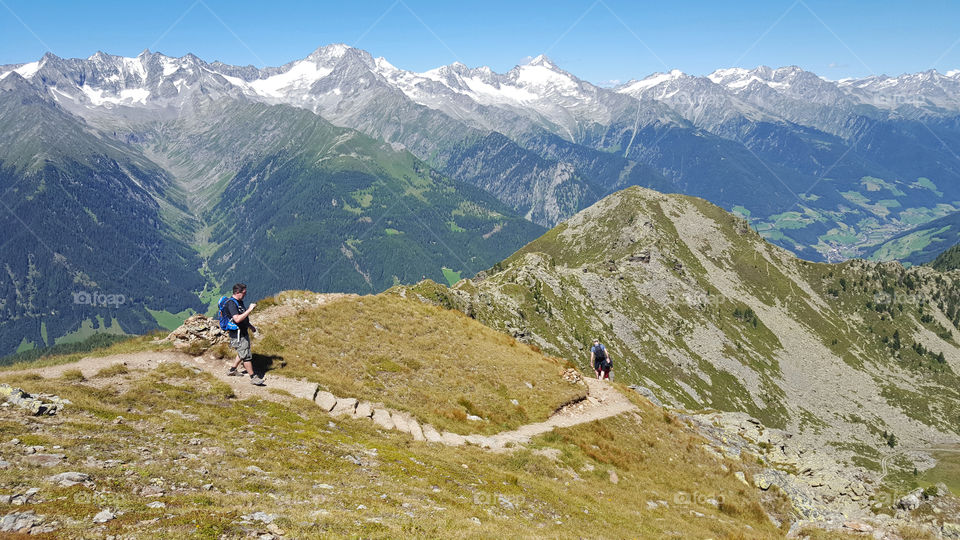 Hiking on high altitude in the mountains, panoramic view 
