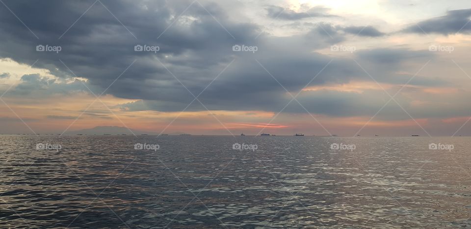 calm sea with sunset