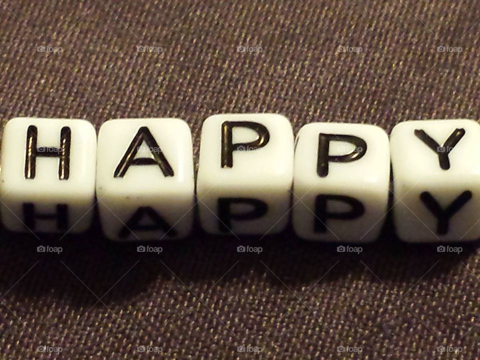 Happy word made with white block