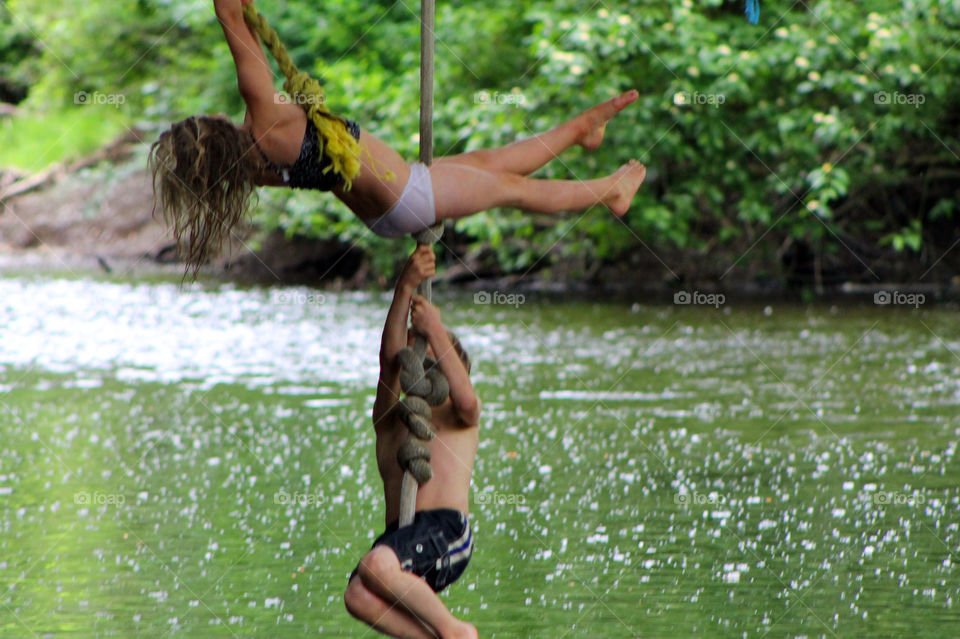 Summertime is for playing in the rivers! Two friends are swinging out over the river trying to work up the nerve to drop into the cold glacier fed river. They eventually made it in but it was pretty shocking. Luckily it was a hot day! 🥶