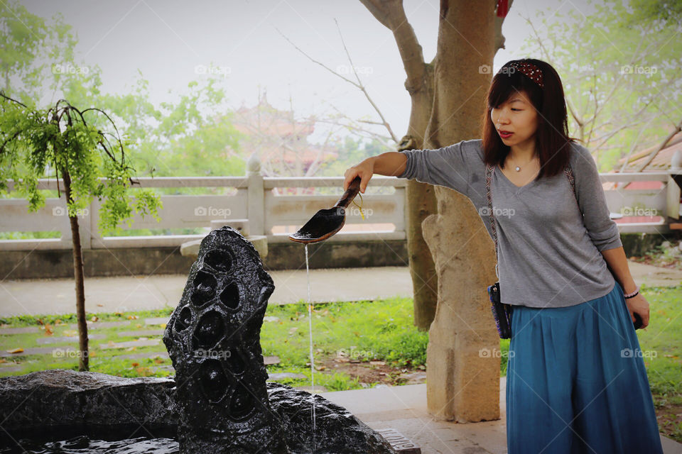 Travel, @Quanzhou, with Monica. Took lots of pics for Monica. A Spa in South Shaolin Temple is as the background, some different feeling were crashing my mind...南少林的一涌泉水，值得驻足。