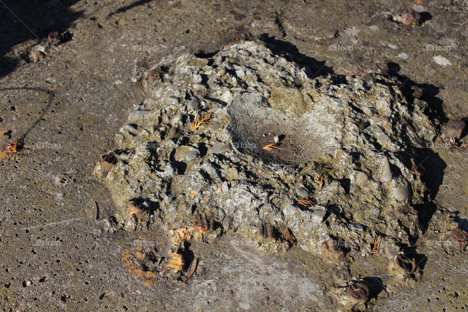 miniature crater mountain from concrete with sharp shadows