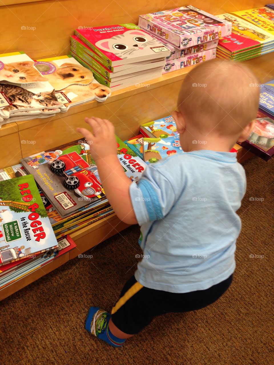 Toddler in bookstore. My son is 9 months old looking at books in a local bookstore. 