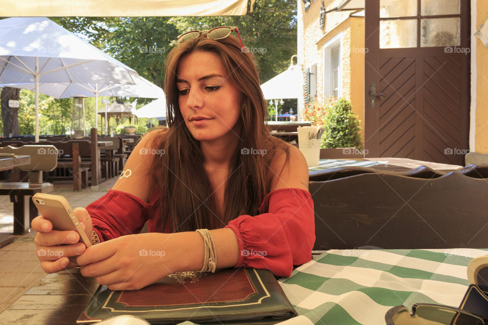 Girl busy with the phone