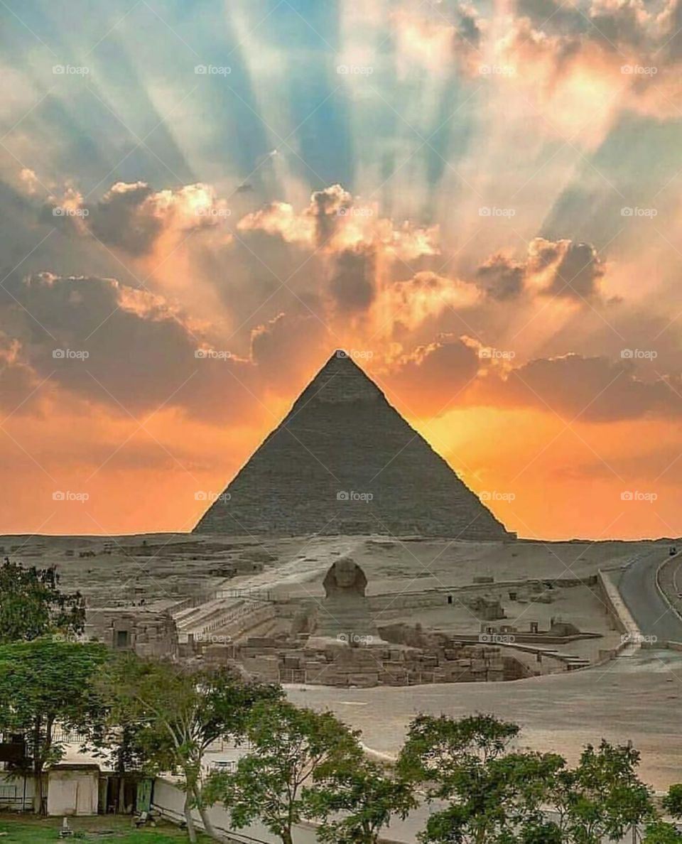 Sunset Behind The Pyramids