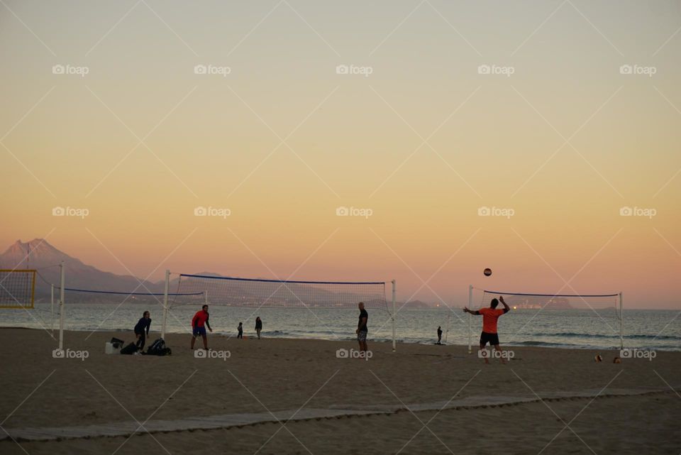 Sunset#sea#sport#sand#humans#sky#play