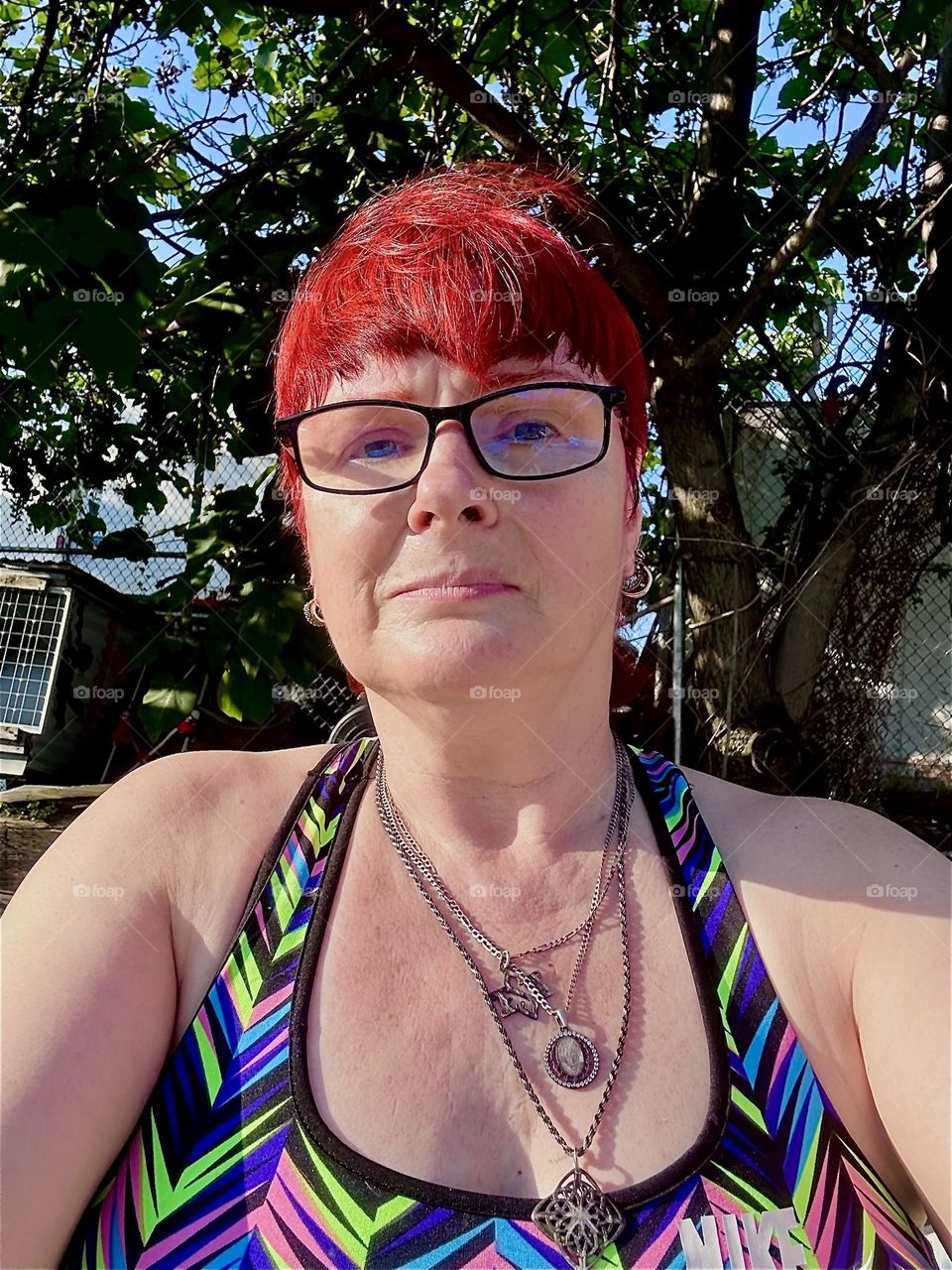 Basking in the summer sunshine on the front deck of “Salvation”, our “28 foot 1969 Luhrs” cabin cruiser moored at “Newtown Creek” by the “Pulaski Bridge” in LIC, Queens this is me, “Petra Schiller” a.k.a. “Maxine Firefox”. 2024. Hypnotic Productions