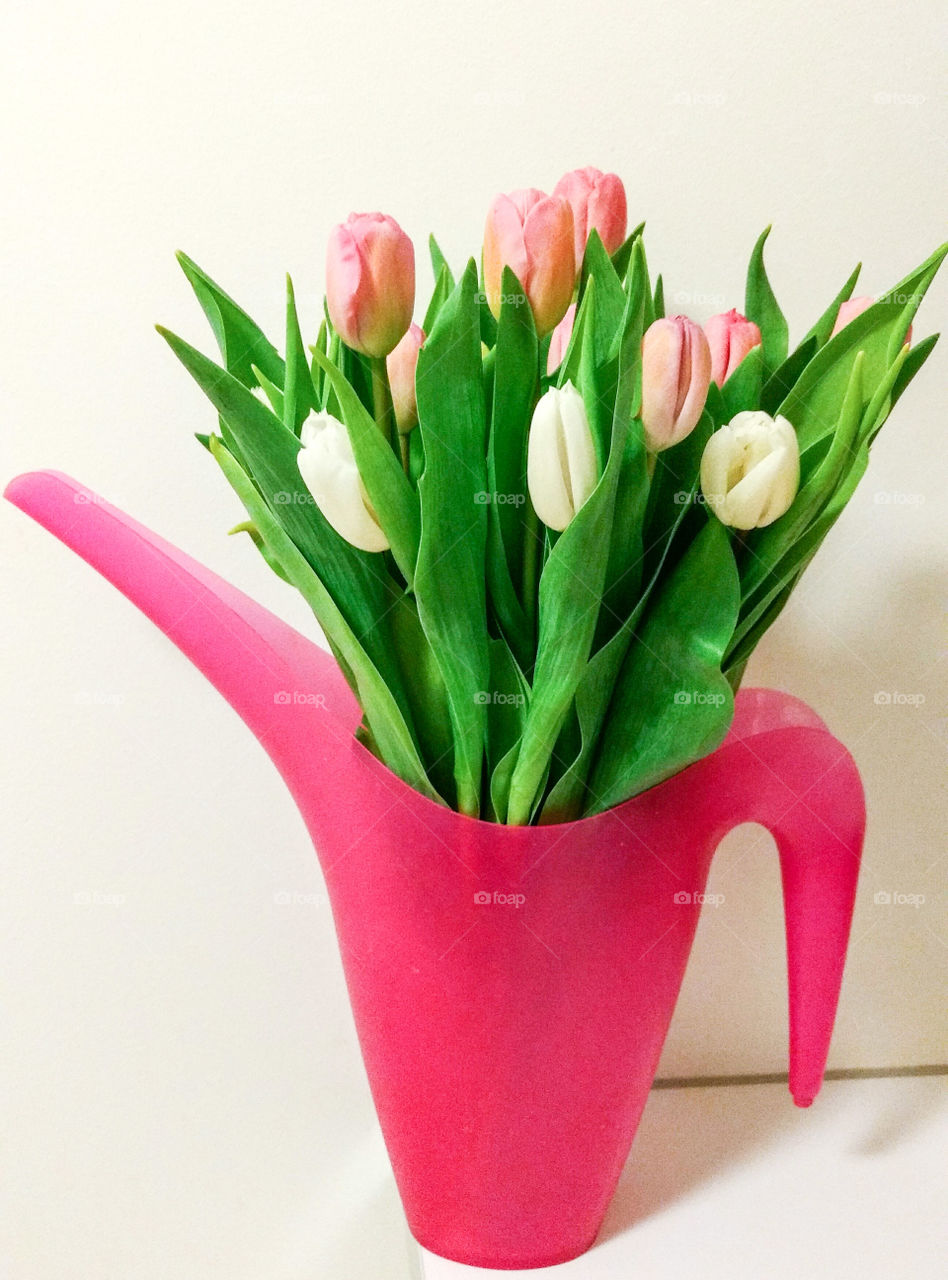 Pink vase with tulips