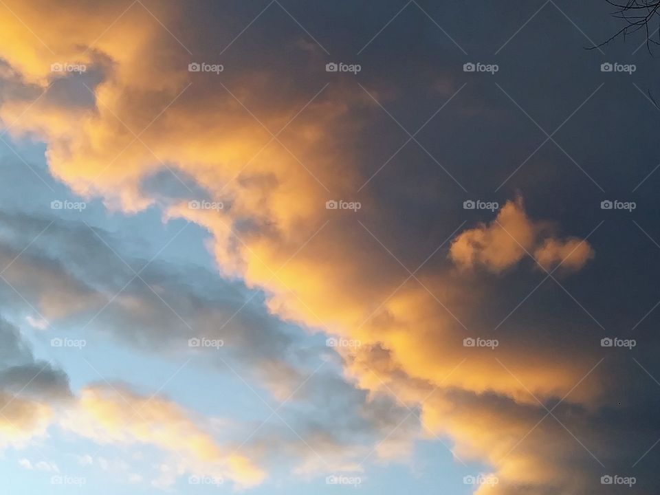 clouds colored by sunset