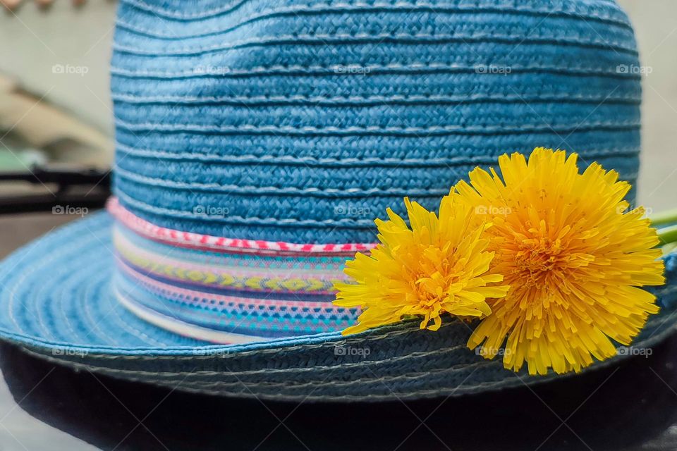 Blue Hat with Yellow Flowers