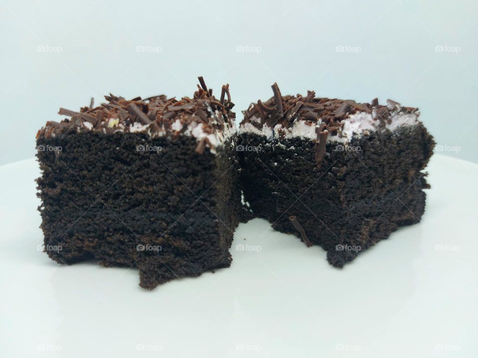 Chocolate taro cake on a white background