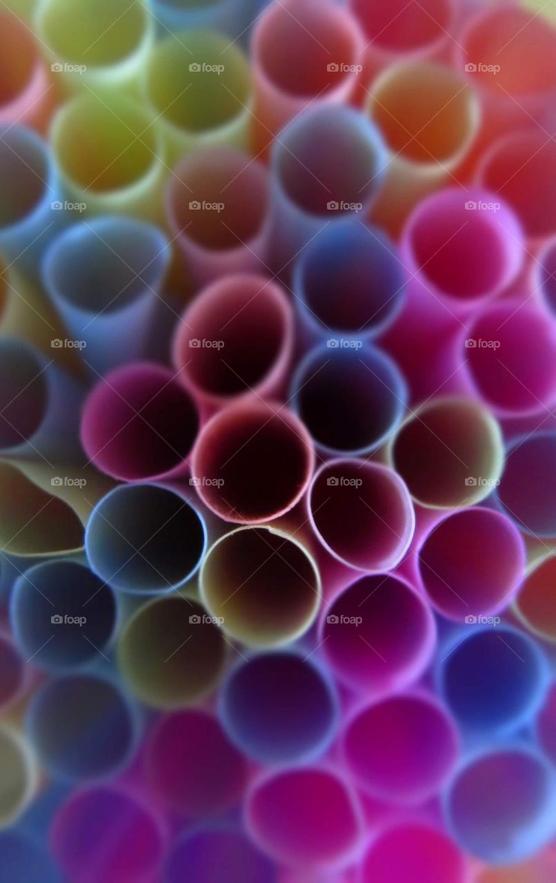 A bunch of colorful Juice straws, perfect for juices,