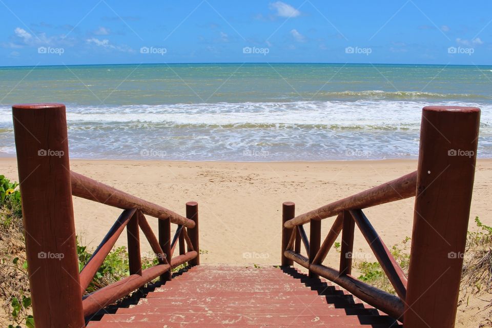 Stairway to deserted beach