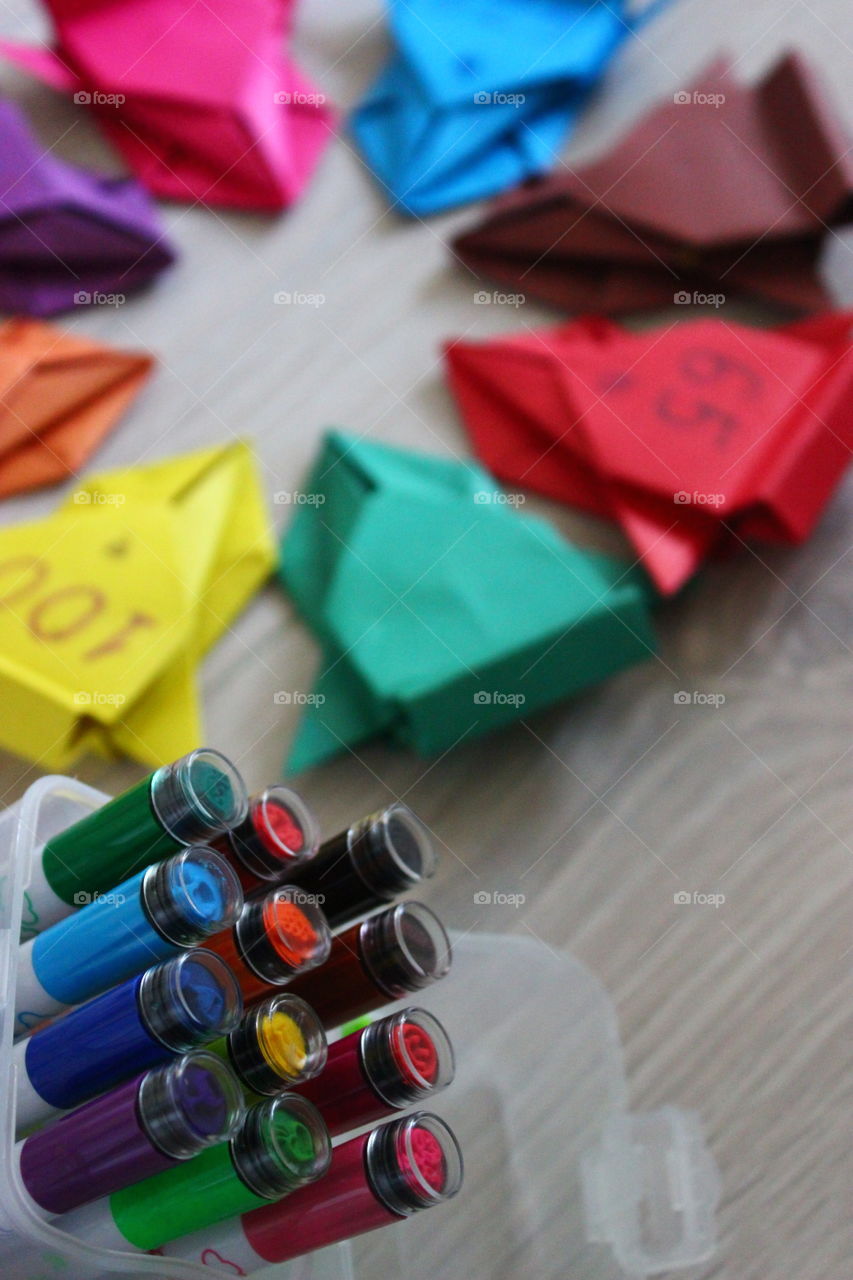 macro shot colour pens paper cars